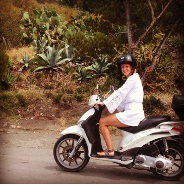 Riding a scooter in the Aeolian islands.